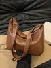 Bolso de axila para mujer modelo nuevo 2026 transfronterizo, bolso de hombro para mujer versátil de moda de alta gama, estilo casual vintage de otoño e invierno