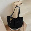 Bolso moderno de lunares de gran capacidad para mujer, nuevo bolso de hombro casual y relajado 2026, adecuado para estudiantes universitarios y personas que van al trabajo