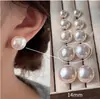 Polvo para Bollos al Vapor Shijia Aretes Perla Blanca Leche Ligera para Mujer Aguja de Plata de Ley S925 Nicho de Gama Alta Versátiles Nuevos Aretes