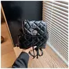 Mochila de Cadena Rombo Inspirada en el Diseño 2026 Nuevo Bolso Cubo de Primavera Textura de Alta Calidad Bolso de Moda para Viajes para Mujeres