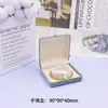 Caja de joyería flocked gris claro transfronteriza con hebilla dorada para anillos, aretes, colgantes y collares; caja organizadora de joyería