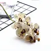 Venta Especial Flor de Orquídea Mariposa Artificial de Película de 7 Cabezas de un Solo Tallo para Decoración del Hogar y Decoración de Fotografía de Bodas