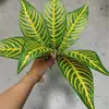 Pequeñas plantas verdes estilo bosque con 7 ramas, láminas de plástico impresas en 3D, hojas simuladas, fabricante mayorista para proyectos de embellecimiento de paredes vegetales