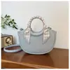 2026 Bolso de Mujer de Alta Calidad Nueva Moda Simple Versátil Bolsa de Comercio Exterior Hombro Único Viajero Diseño de Nicho Bolso Cruzado