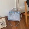 Bolso de Mano Simple de Gran Capacidad para Mujer 2026 Nuevo Moda Europea y Americana Bolso de Hombro Texturizado para el Trabajo y los Viajes Diarios Bolso Cruzado