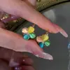Aretes de Flor de Trébol de Cuatro Hojas Fresca Estilo Mori de Alta Calidad Dulces de Doble Cara Piedra Ojo de Gato Pendientes Versátiles
