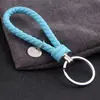 Al por Mayor Punto Creativo Cuerda de Cuero Trenzada Círculo Único Llavero Muñeca Bola de Pelo Llavero Accesorios para Llaves Joyería