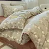 Juego de Cama de Cuatro Piezas de Terciopelo de Leche Casual de Invierno 2025 Nuevo Juego de Cama de Tres Piezas con Funda de Edredón de Felpa de Terciopelo Coral y Sábanas