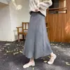 Novo vestido de tricô, modelagem solta, comprimento médio, saia evasê, barra larga, adequado para usar como peça externa no outono e inverno
