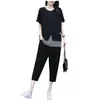 Nuevo traje de verano para mujer talla grande Adelgazante Holgado Moda Elegante Rayas Camiseta de manga corta Pantalones de nueve cuartos Conjunto de dos piezas