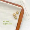 Cobre chapado en oro real que conserva el color incrustado con circonita cúbica gota aceite peonía cuentas redondas huecas cuentas espaciadoras pulsera de hilo de mano DIY accesorios de cuentas sueltas