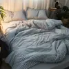 Juego de ropa de cama a cuadros minimalista estilo japonés INS de cuatro piezas, funda de edredón, sábana, juego de tres piezas para dormitorio