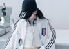 Conjunto de Moda Primavera 2026 Feminino Estilo Retro Americano Esportivo Casual: Jaqueta Camisa de Manga Longa e Calça de Cintura Alta Wide-Leg