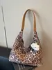 Bolso tote de gran capacidad con estampado de leopardo de moda, diseño de nicho coreano, bolso de hombro y axila elegante y a la moda para ir al trabajo
