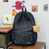 Mochila texturizada de cielo azul nublado con estrellas para estudiantes, que ofrece un ambiente de campus de ensueño, adecuada para clases, vacaciones y uso casual, bolsa versátil de doble hombro