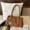 Bolso de hombro retro, minimalista y moderno de lunares para mujer, perfecto para otoño, una opción única y elegante para ir al trabajo, un bolso de mano de alta gama y versátil