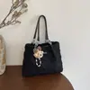 Bolso de mano simple para mujer 2026 nuevo modelo, lindo bolso tote para mujer, bolso de hombro para commuting de nicho de gran capacidad, bolso de mano versátil
