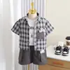 Conjunto de Verano para Niños 2026 Nuevo de Moda Patchwork Cuadros Conjunto de Dos Piezas Ropa de Bebé Verano Manga Corta Infantil Tendencia
