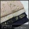 Fondo negro hilo dorado jacquard repujado tela jacquard de seda dorada textura tridimensional cóncavo-convexa bolso vestido tejido teñido en hilo
