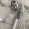 Cabezal de ducha de refuerzo con filtro de iones negativos, cabezal de ducha de spa de mano que ahorra agua, cabezal de ducha de fábrica al por mayor