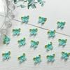 Yiwu nuevas joyas para uñas macaron Gardenia decoraciones para uñas luminosas para usar joyas para uñas aretes accesorios