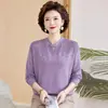Moda en tops de punto de otoño para madres, nuevo estilo 2026, suéteres elegantes para mujeres de mediana edad y mayores para primavera y otoño
