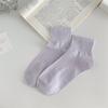 Calcetines de mujer primavera y verano 2024 nuevos color caramelo dopamina Blanco calcetines pequeños calcetines de algodón para mujer al por mayor