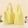 Suministro directo transfronterizo de bolsas de lona de colores lisas listas para usar, bolsas de lona tipo tote multicolor, bolsos de hombro de gran capacidad para el trabajo