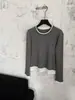 Camiseta básica de manga larga con cuello redondo, ribete fino y bloques de color GAGD de Tencel Lyocell para mujer, estilo retro americano, diseño de imitación de dos piezas, camiseta con corte de hombro regular