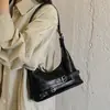 Bolsa feminina de axila 2026 nova tendência outono versátil de alta qualidade para o trabalho bolsa de ombro moda bolsa transversal estilo bolinho