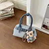 Bolsos de mujer de nicho 2026 nuevo verano súper popular bolso de hombro para ir al trabajo bandolera bolso tipo concha