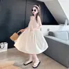 Saias de Menina Verão 2026 Novo Estilo Roupas de Verão para Meninas Grandes Vestido Regata Preto Vestido com Gola Halter Estilo Coreano Infantil