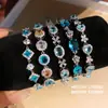 ¡Mar de Glamour en tu Muñeca! Pulsera de lazo ovalado de circón europeo y americano, sensación de lujo ligero y alta gama, joyería de nicho de moda