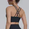 Novo top esportivo de nylon-spandex com lindo design nas costas, regata de yoga com amarração cruzada, à prova de choque, top fitness justo com sensação de pele.