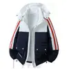 Talla europea cruzada se puede personalizar color exterior bloques de color rayado acolchado de algodón ropa hombres invierno con capucha holgada acolchado de algodón chaqueta pan abrigo hombres