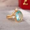 Anillo de lujo Cao Shi con diseño transfronterizo europeo y americano, corona dorada y circón azul ovalado para mujer