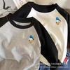 Ropa infantil de algodón puro para primavera y otoño, nueva, de moda para niños y niñas, con estampado de dibujos animados, camiseta de manga raglán a juego con colores