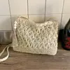 Bolso tejido transfronterizo nuevo, bolso de hombro de moda para mujer, bolso de paja simple calado, bolso cruzado de color liso para vacaciones en la playa