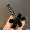 Luz de luxo vintage veludo laço hairpin pequeno Chanel estilo cinza strass estilo avançado bangs clip uma palavra clipe lateral para as mulheres