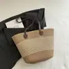 Bolsa de Palha Trançada 2025 Verão Nova Commuter Grande Capacidade Listrada Ombro Único Moda Bolsa de Praia para Mulheres