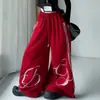 Outono 2026 roupa de menina novo estilo: Conjunto de duas peças da moda para primavera e outono, composto por uma blusa de manga comprida e calças de perna larga de tricô com enfeites de strass.