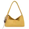 Outono/Inverno 2026 Novo Estilo Coreano Simples Moda Retrô Bolsa de Mão para o Trabalho Tendência Versátil Bolsa de Ombro Único para Sobrancelha