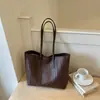 2026 Nova Moda para o Dia a Dia Bolsa de Palha Tecida Grande Capacidade Bolsa Simples para Mulheres Bolsa de Ombro Versátil de Alta Qualidade Tendência