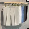 Pantalones cortos de traje finos de verano para hombre, pantalones casuales de moda, pantalones rectos ajustados de color liso para hombres de negocios