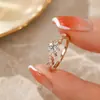 Fonte de live streaming do TikTok: Anel de noivado de ouro rosa 18K e ouro branco com diamante imitação de moissanita de 1 quilate em formato de raio de sol para mulheres, atacado
