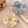 Goma para el pelo azul floral pequeña estilo pastoral para mujer, nuevo accesorio para el pelo grande para coleta baja francesa de primavera 2026