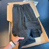 Pantalones jacquard de estilo retro americano con estampado oscuro, colección de otoño para hombre, con un diseño fluido de alta gama, corte recto y un ajuste relajado y holgado para uso casual