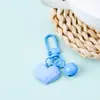 Nuevo Estilo Cortado Cara Amor Llavero Colgante Color Caramelo Campana Accesorios DIY Bolso de Pareja Auriculares Colgante Accesorios