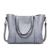 2023 nuevo bolso de moda europeo y americano para mujer bolso tote de cuero encerado de moda bolso de hombro simple para mujer una generación de pelo