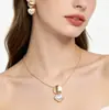 Colar com Pingente de Coração em Forma de Anel Criativo Mais Vendido Transfronteiriço para Mulheres e Brincos, Conjunto de Joias Elegante e Versátil Atacado